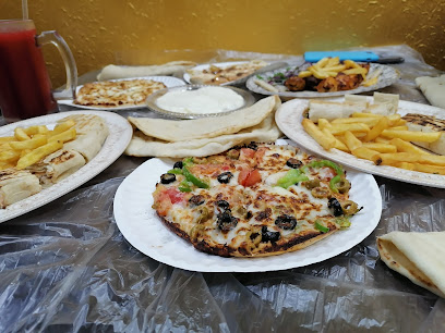 مطعم الشجرة - ابو عريش - +966 17 325 3444